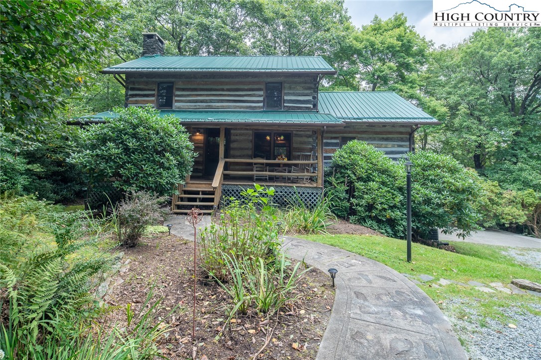 142 Teaberry Path Boone, NC 28607 - Photo 3 of 19 a view of a house with a yard