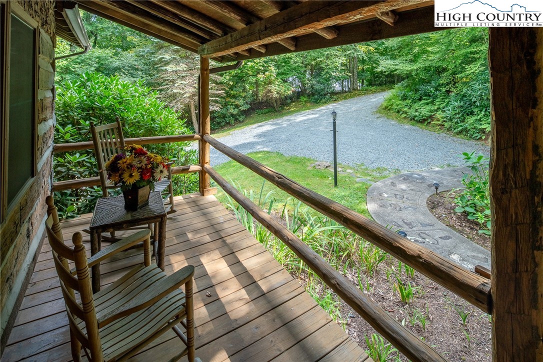 142 Teaberry Path Boone, NC 28607 - Photo 4 of 19 a view of a two chair in the balcony