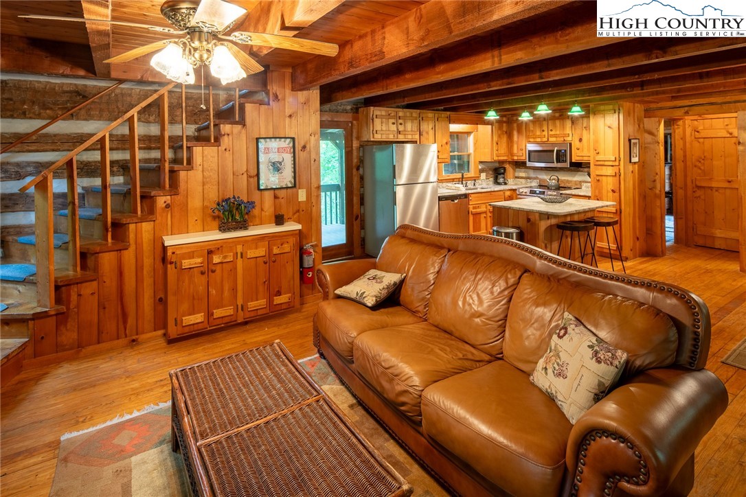 142 Teaberry Path Boone, NC 28607 - Photo 6 of 19 a view of a living room and a balcony