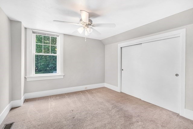 54 Harris Street, Unit 54 Acton, MA 01720 - Photo 6 of 9 an empty room with a window