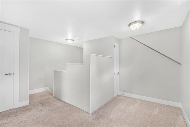 54 Harris Street, Unit 54 Acton, MA 01720 - Photo 7 of 9 a view of an empty room