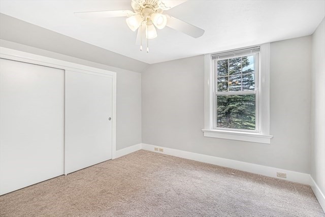 54 Harris Street, Unit 54 Acton, MA 01720 - Photo 8 of 9 a view of an empty room with a window