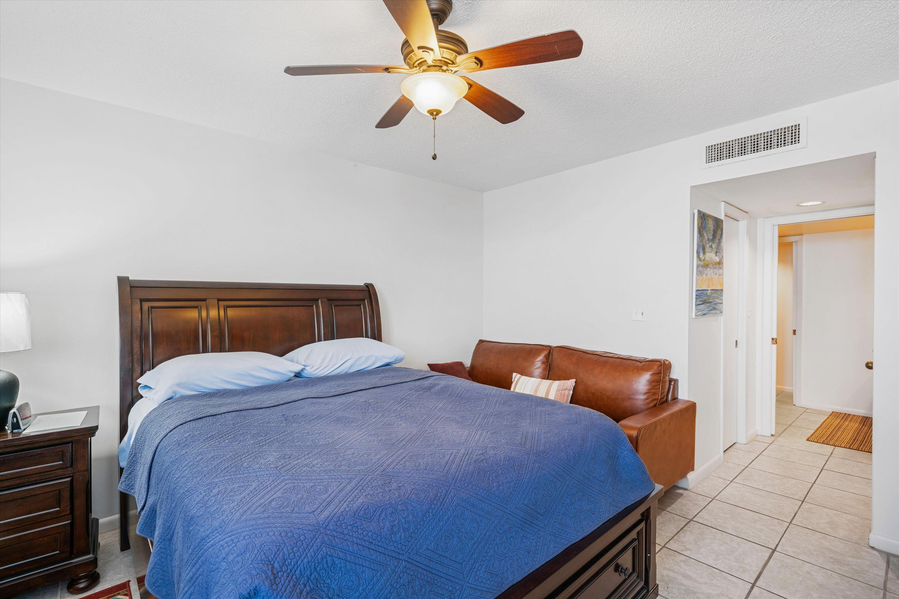 200 Wagner Street, Unit 604 Memphis, TN 38103 - Photo 16 of 36 Bedroom with a ceiling fan and light tile patterned floors