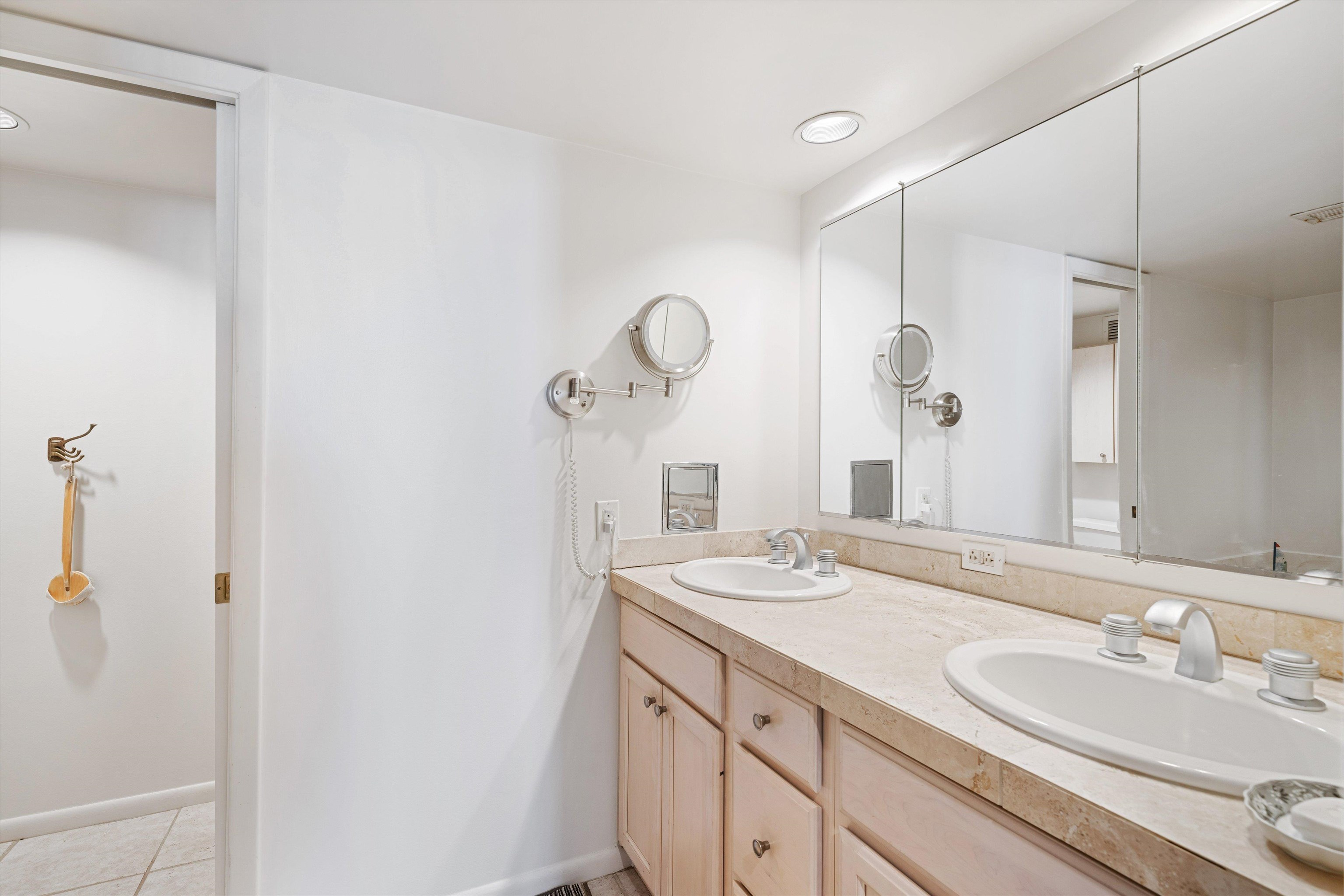 200 Wagner Street, Unit 604 Memphis, TN 38103 - Photo 17 of 36 Bathroom with double vanity, light tile patterned flooring, and recessed lighting