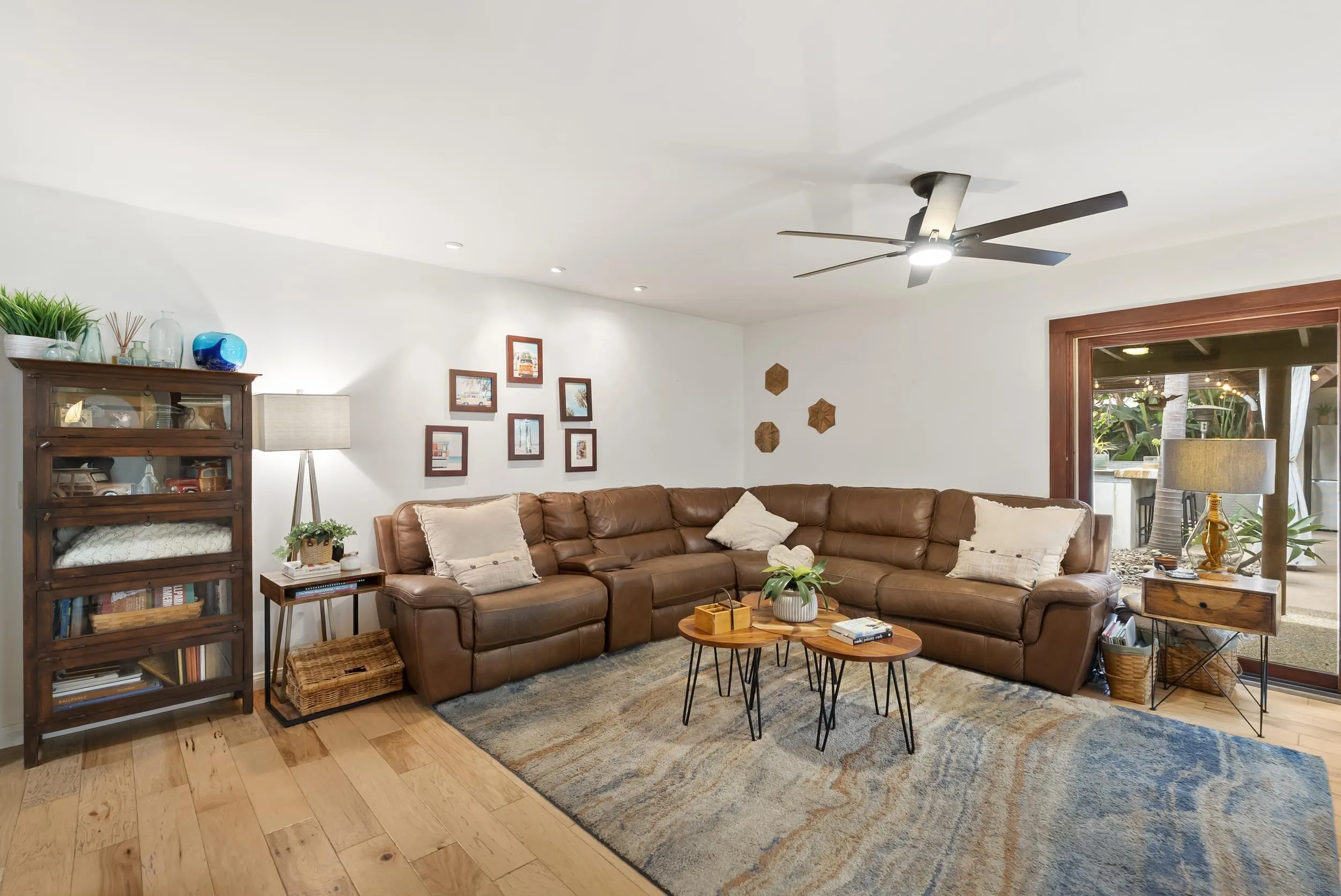 489 La Costa Avenue Encinitas, CA 92024 - Photo 12 of 45 a living room with furniture a ceiling fan and a window