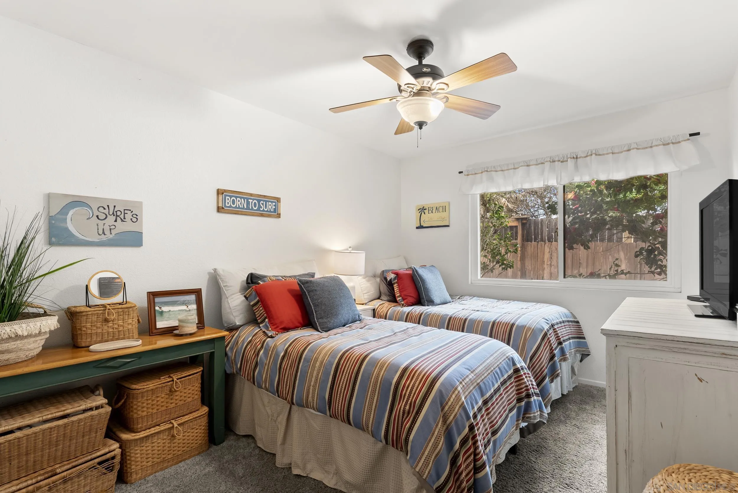 489 La Costa Avenue Encinitas, CA 92024 - Photo 15 of 45 a bedroom with a bed and a window