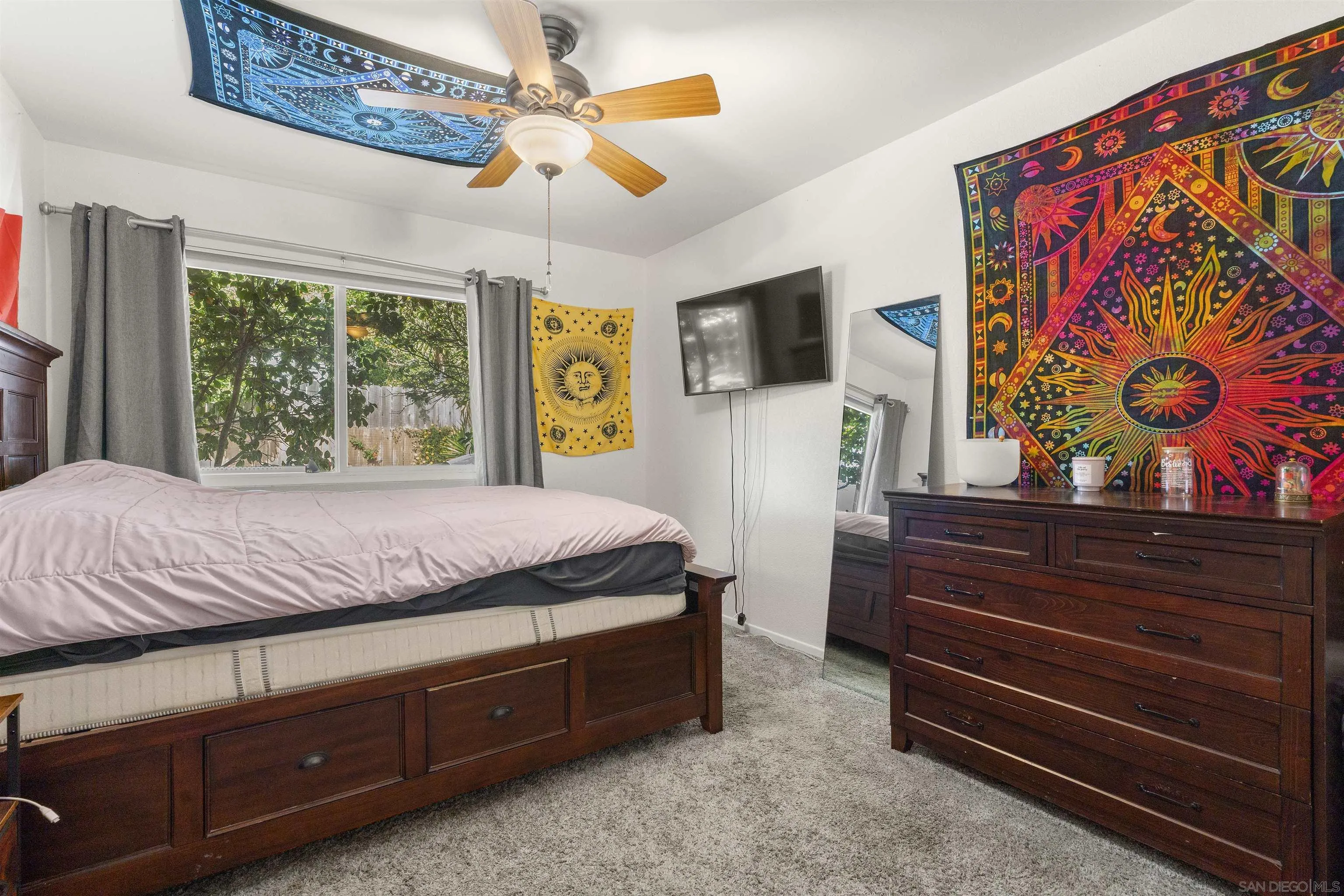 489 La Costa Avenue Encinitas, CA 92024 - Photo 28 of 45 a bedroom with a bed and a flat screen tv