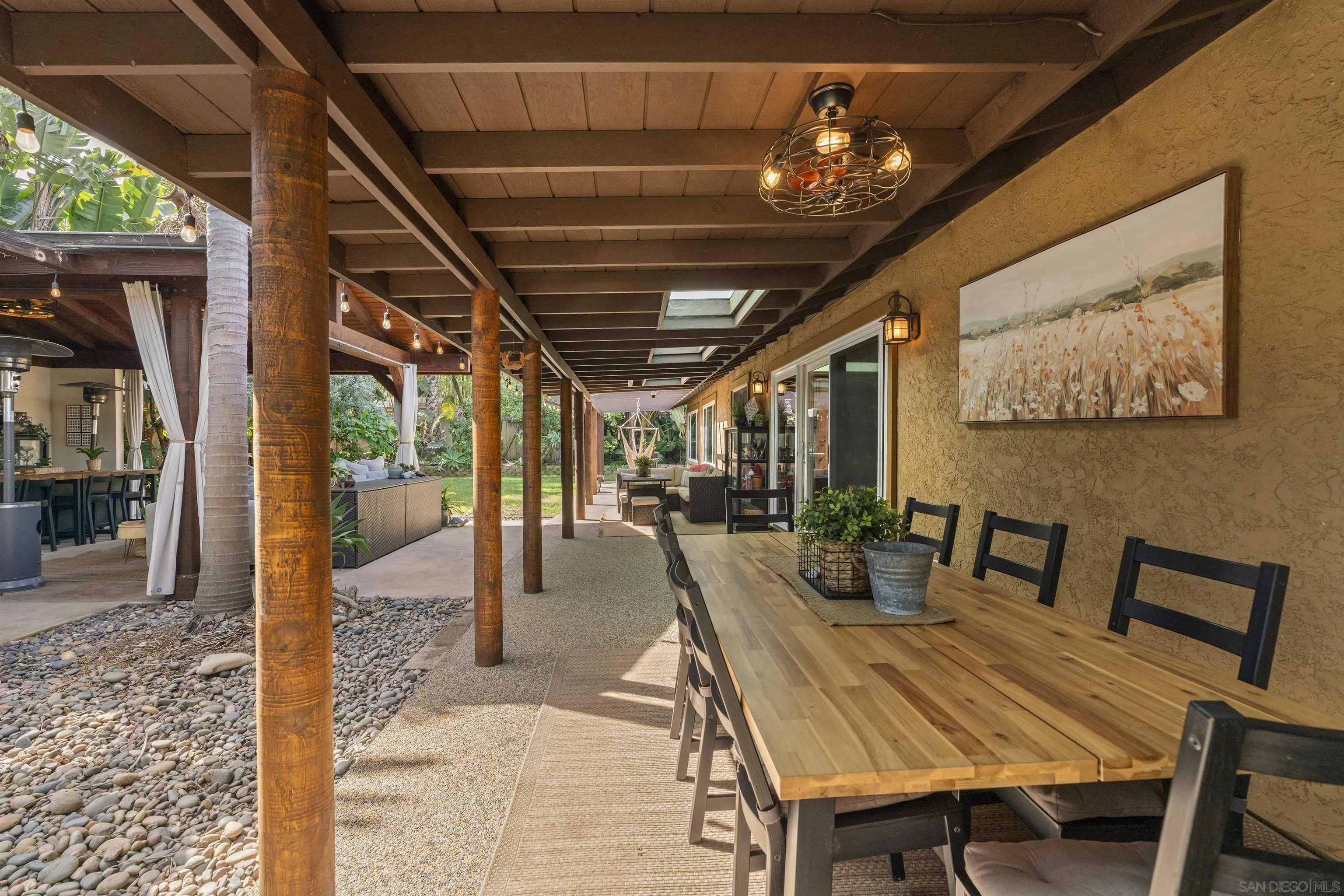 489 La Costa Avenue Encinitas, CA 92024 - Photo 30 of 45 a view of a dining room with furniture