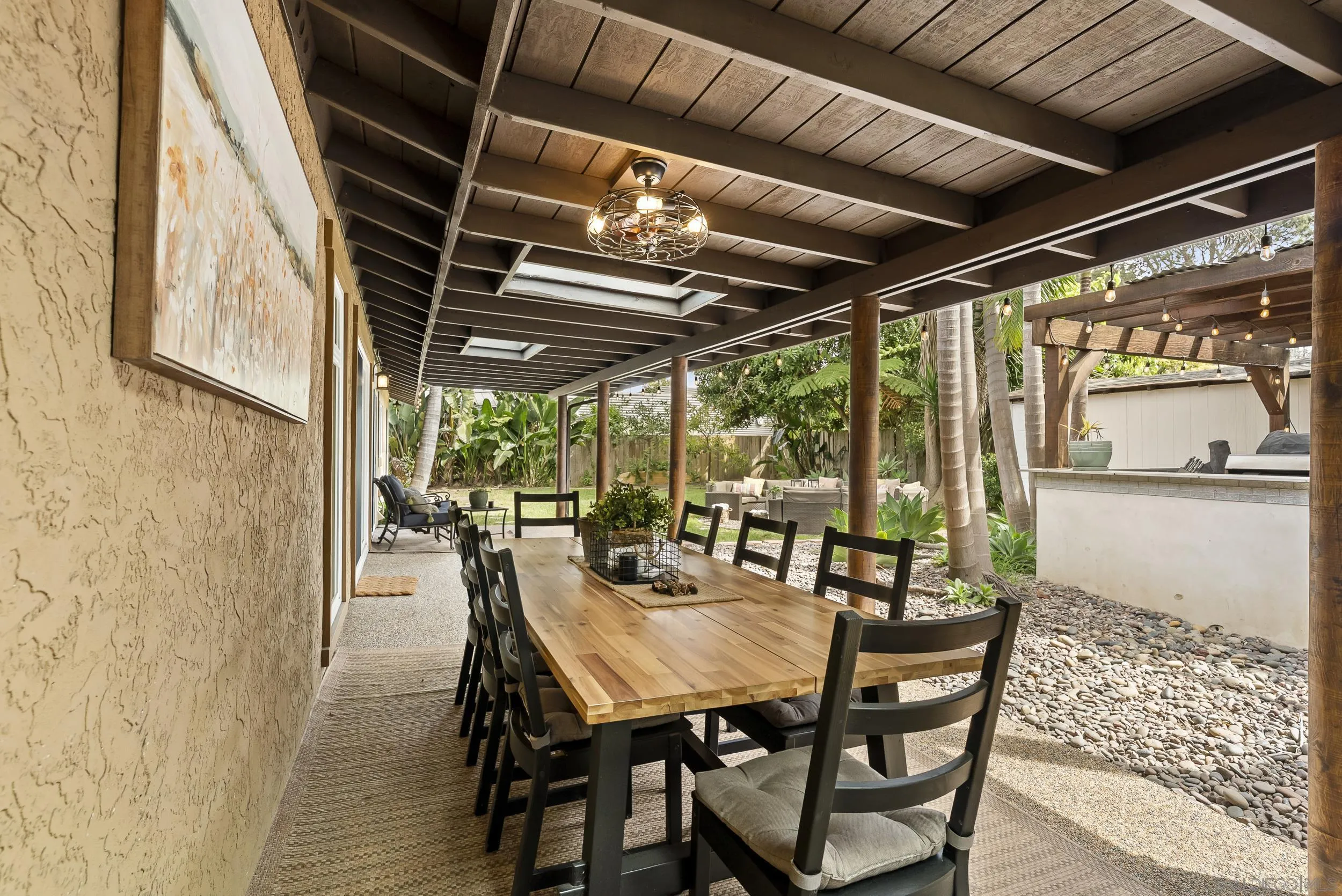 489 La Costa Avenue Encinitas, CA 92024 - Photo 38 of 45 a view of an outdoor dining space with furniture