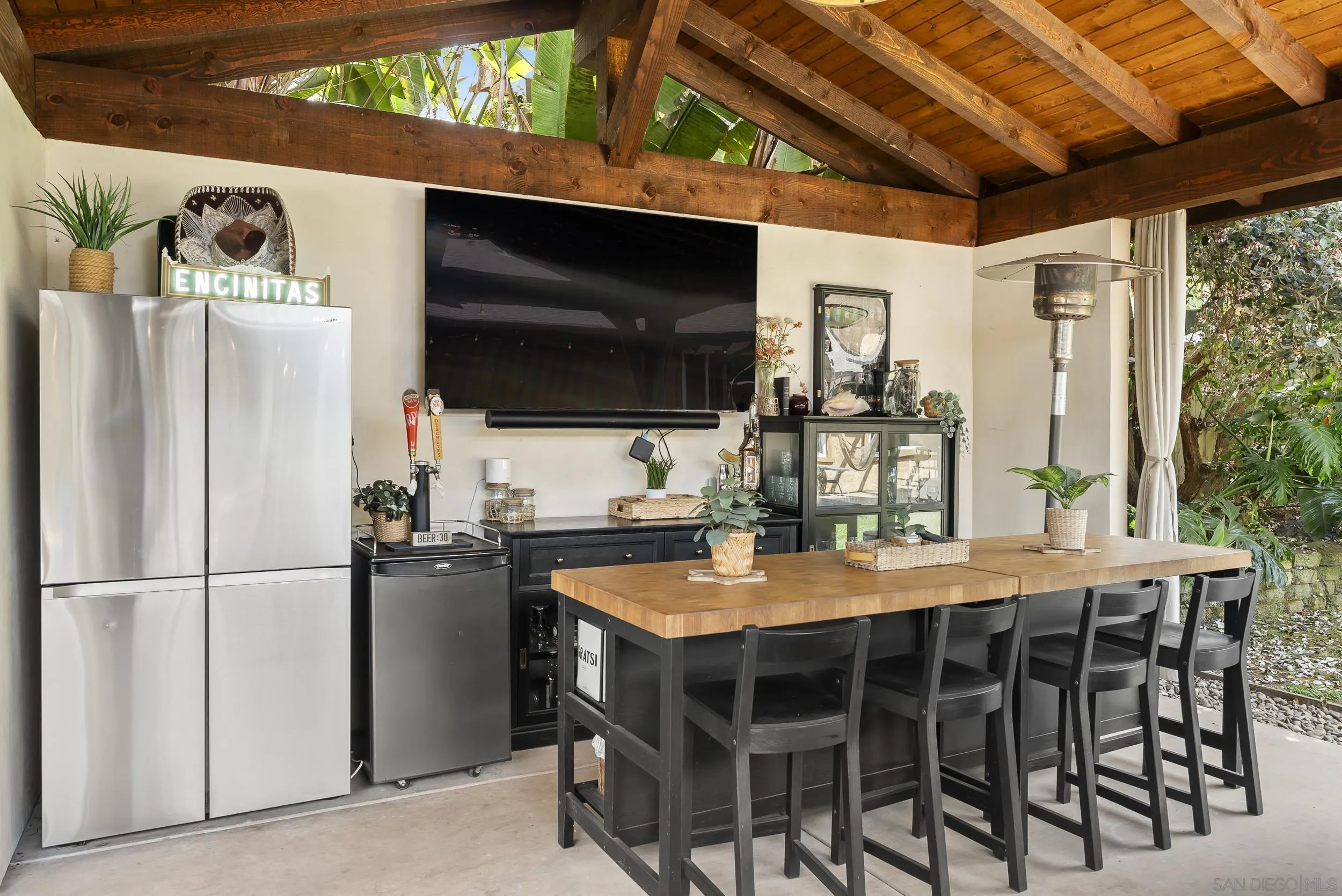 489 La Costa Avenue Encinitas, CA 92024 - Photo 43 of 45 a dining table chair and refrigerator