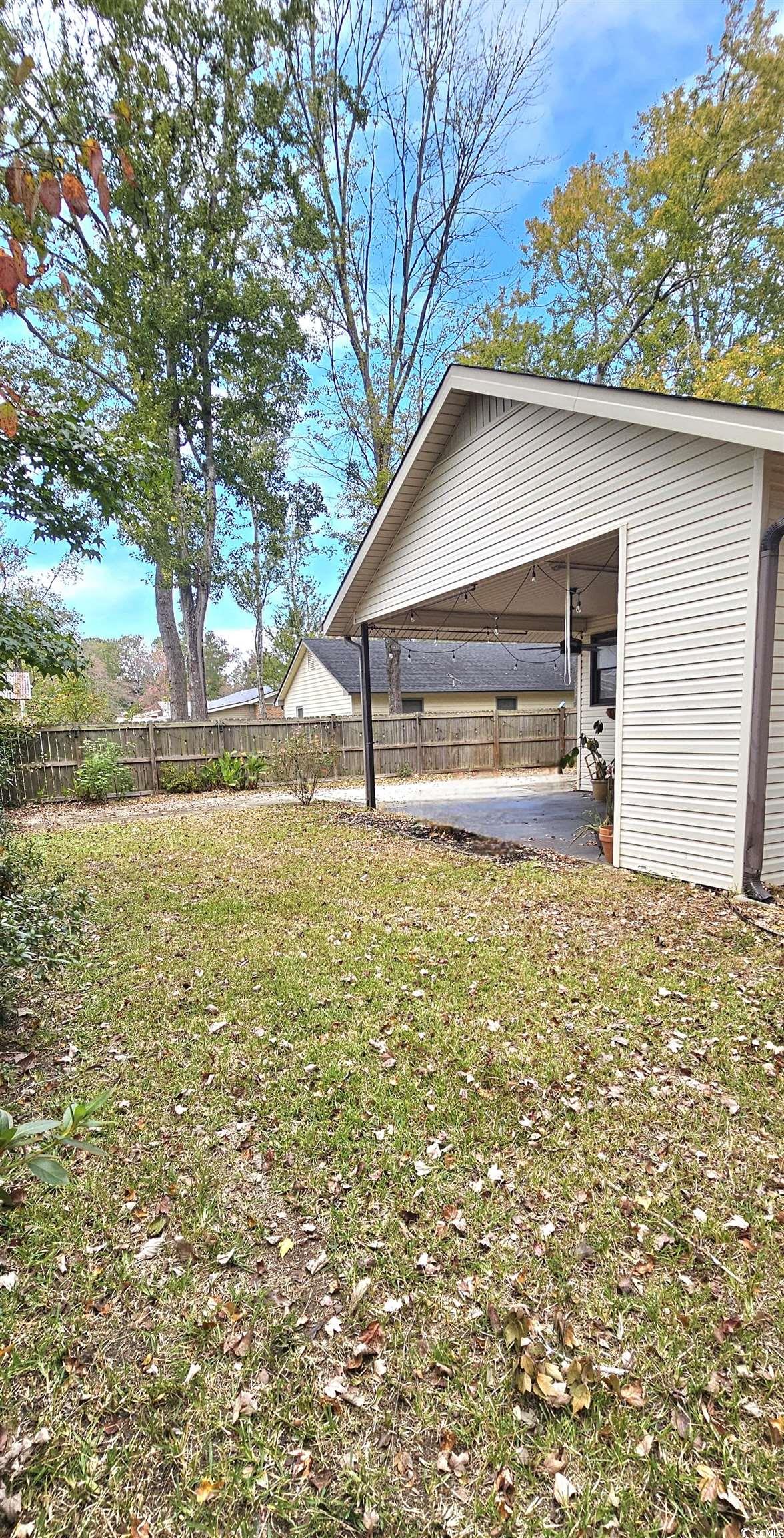 117 Partridge Berry Road Myrtle Beach, SC 29579 - Photo 31 of 33 View of yard with a patio area