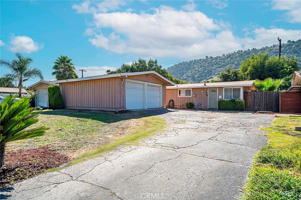 a view of a house with a garden