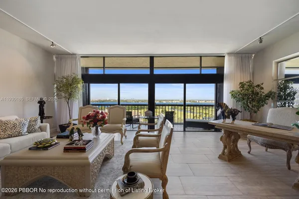 a room with gym equipment and a large window