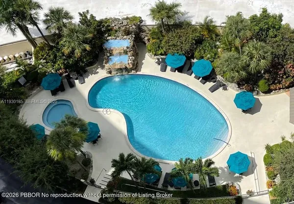 a view of a swimming pool and outdoor space