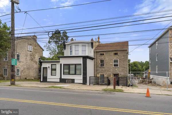 a view of a building and a refrigerator