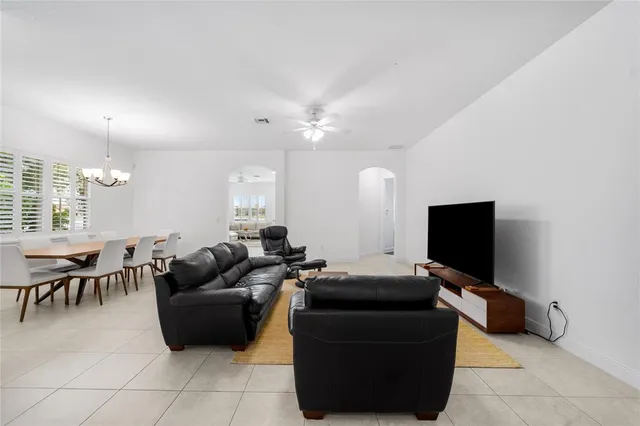a bathroom with a sink vanity mirror and toilet