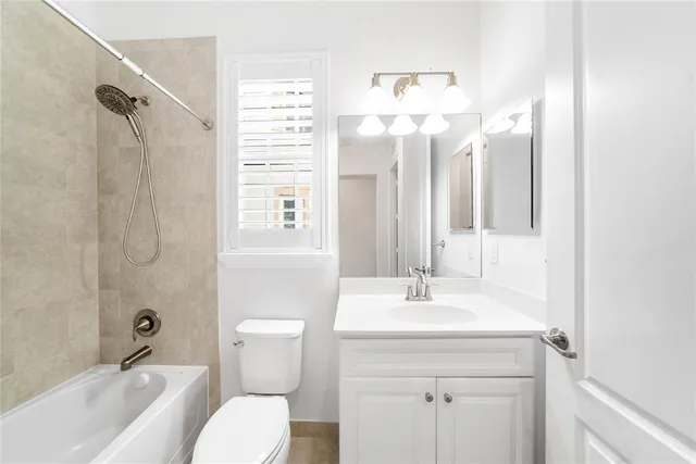 a view of a patio with a table chairs and a yard