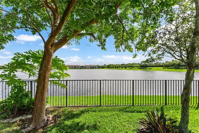 an aerial view of a house with outdoor space