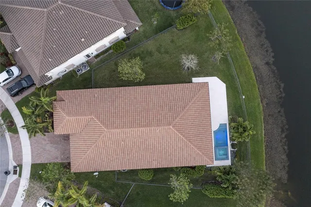 a kitchen with stainless steel appliances granite countertop a sink and a stove