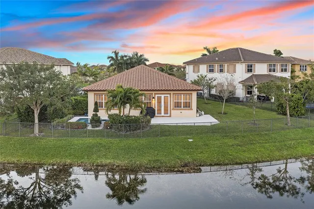 $934,900 | 9820 South Miralago Way, Parkland, FL 33076