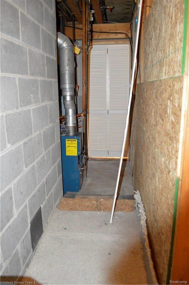 9797 Van Buren Road Fowlerville, MI 48836 - Photo 53 of 56 PELLET STORAGE IN BASEMENT (WILL HOLD A WHOLE TON OF PELLETS)