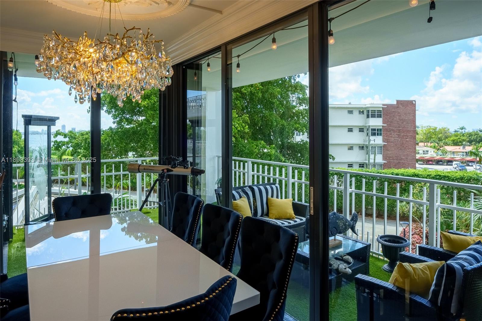 4000 Towerside Terrace, Unit 410 Miami, FL 33138 - Photo 4 of 74 a view of a dining room with furniture window and outside view