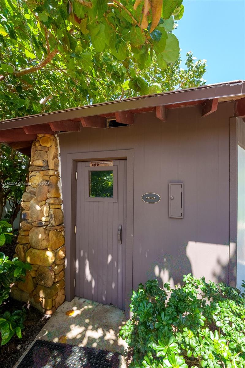 4000 Towerside Terrace, Unit 410 Miami, FL 33138 - Photo 41 of 74 an outdoor view of patio with green space