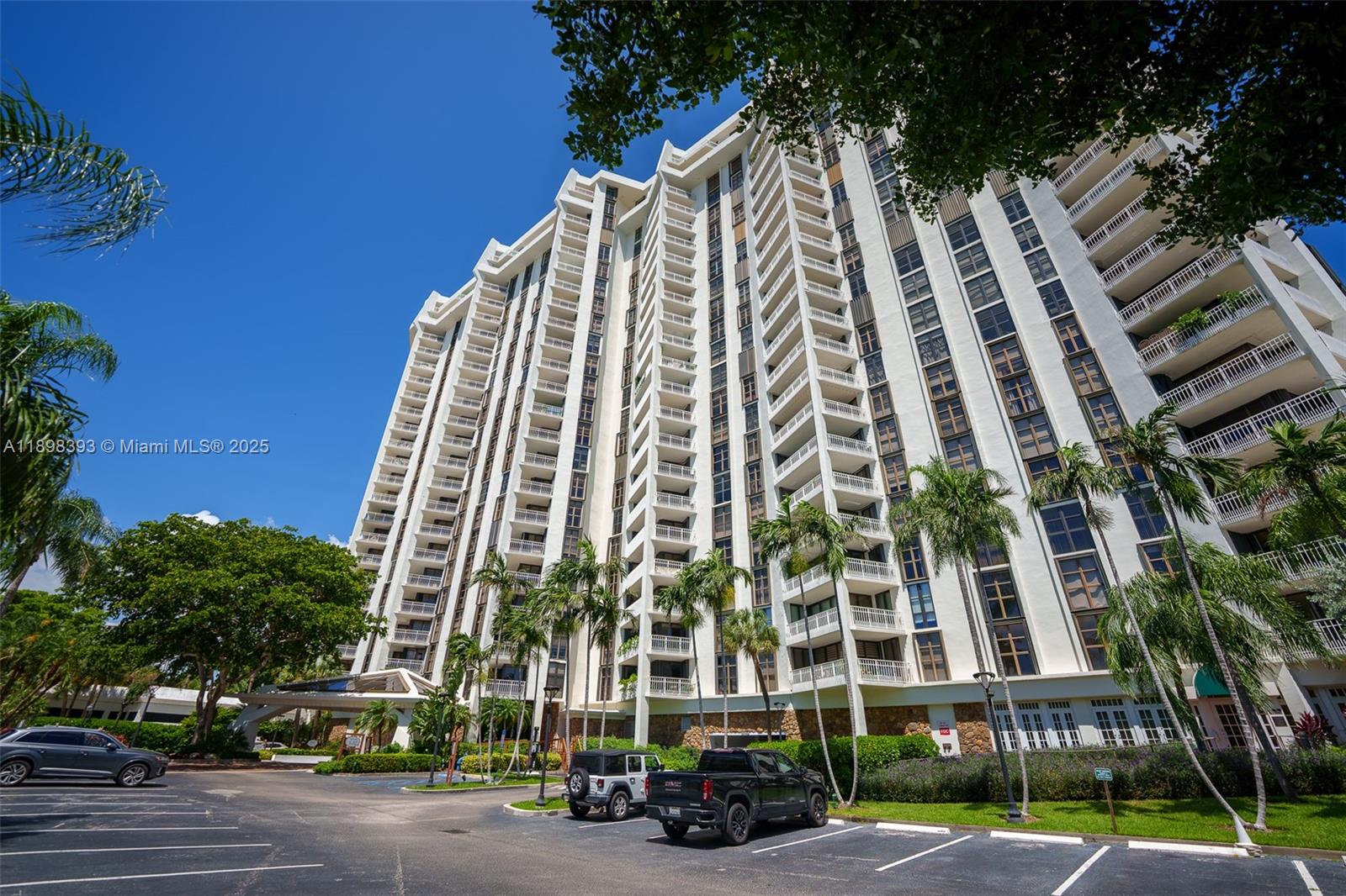 4000 Towerside Terrace, Unit 410 Miami, FL 33138 - Photo 50 of 74 front view of a building with a street