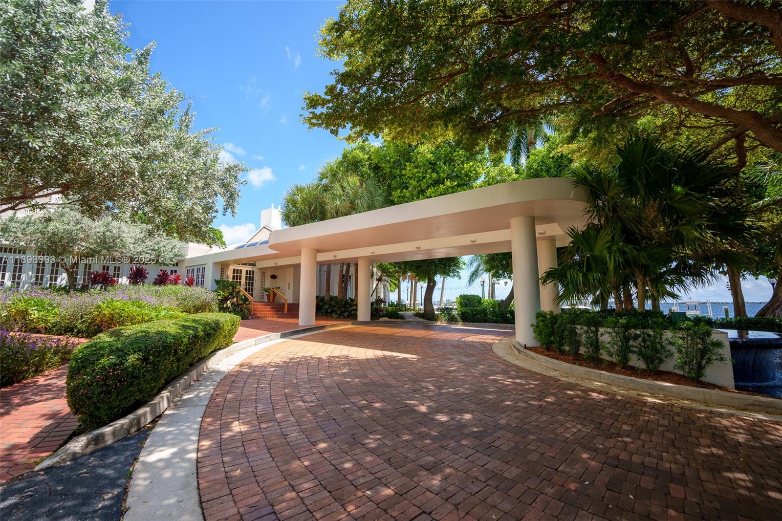 4000 Towerside Terrace, Unit 410 Miami, FL 33138 - Photo 51 of 74 a front view of a house with a yard and green space
