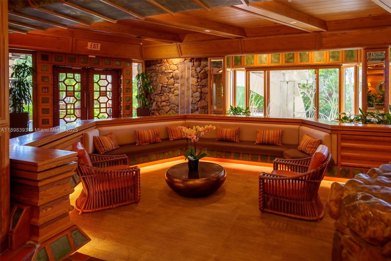 4000 Towerside Terrace, Unit 410 Miami, FL 33138 - Photo 60 of 74 a outdoor living space with furniture and a potted plant