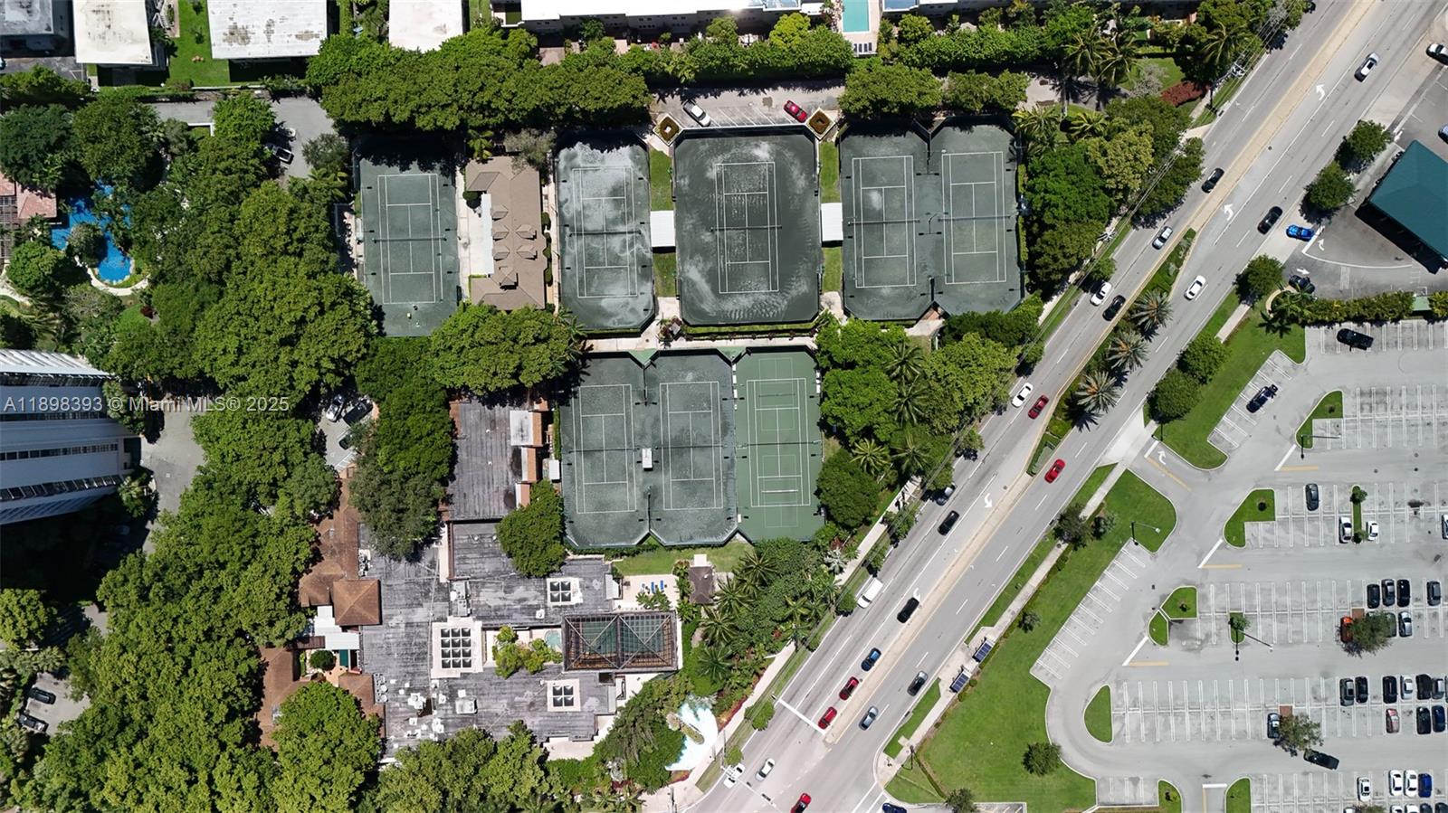 4000 Towerside Terrace, Unit 410 Miami, FL 33138 - Photo 73 of 74 an aerial view of multiple houses with yard