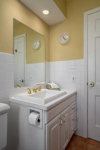 a utility room with a sink and a washer