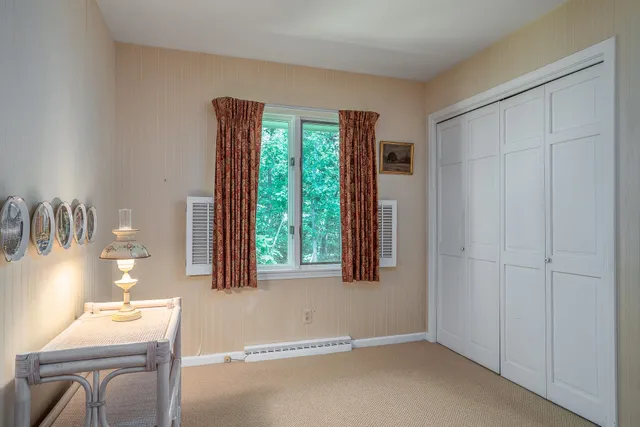 a view of livingroom with furniture and window