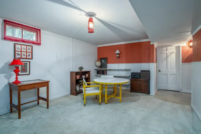 a workspace with furniture and window