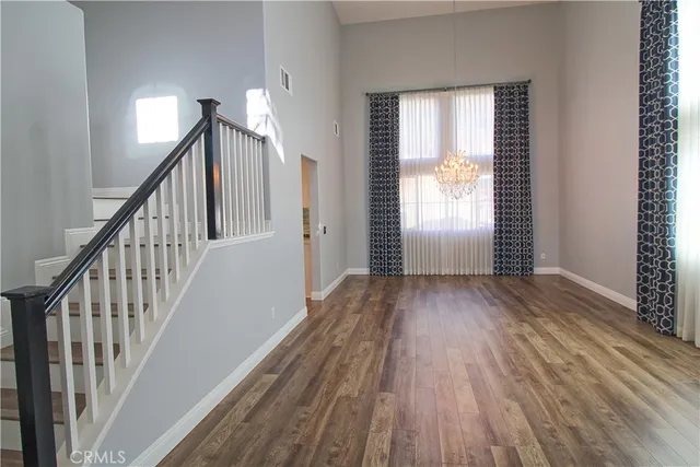 a view of entryway with wooden floor