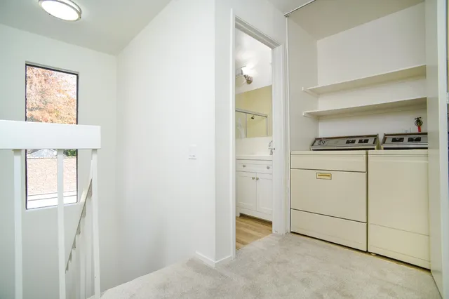 a view of cabinets and window