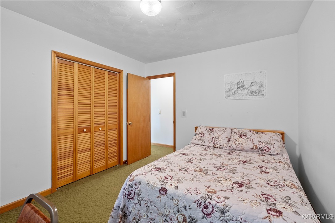 5290 Crumptown Road Farmville, VA 23901 - Photo 13 of 43 a bedroom with a bed and a window