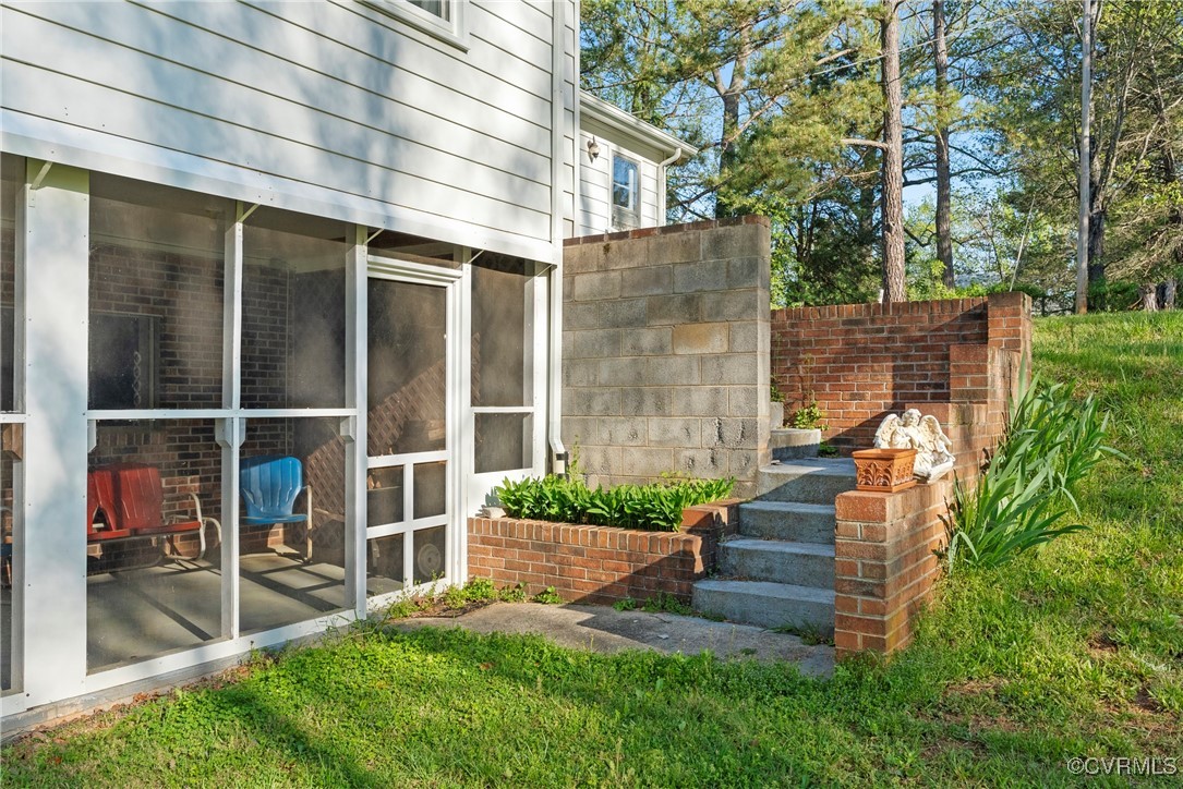 5290 Crumptown Road Farmville, VA 23901 - Photo 25 of 43 a view of house with backyard sitting area and garden