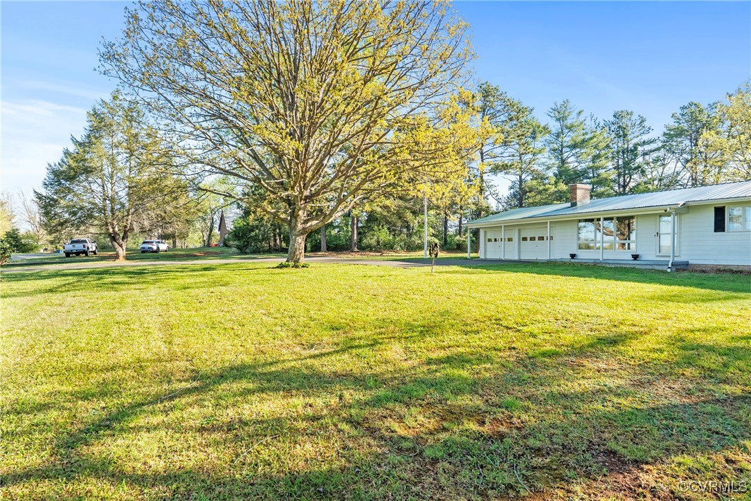 5290 Crumptown Road Farmville, VA 23901 - Photo 28 of 43 a view of a swimming pool with an outdoor space and seating area