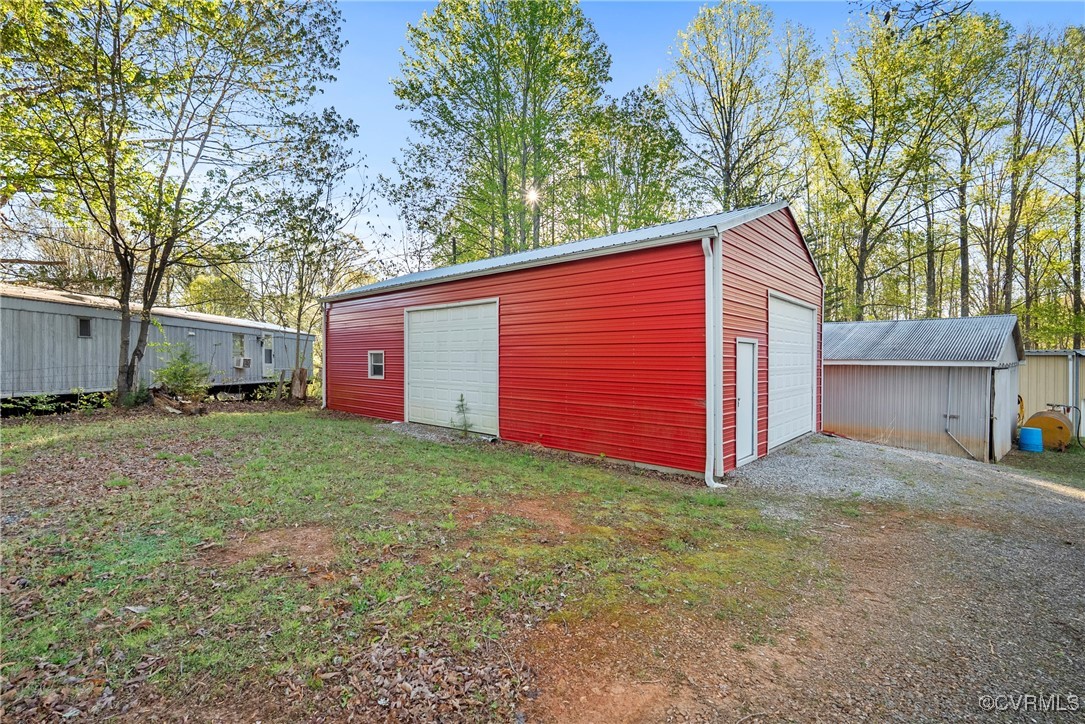 5290 Crumptown Road Farmville, VA 23901 - Photo 30 of 43 a view of a backyard with large tree
