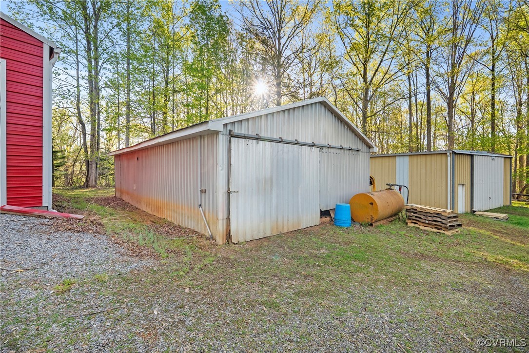 5290 Crumptown Road Farmville, VA 23901 - Photo 32 of 43 a view of a house with backyard and trees