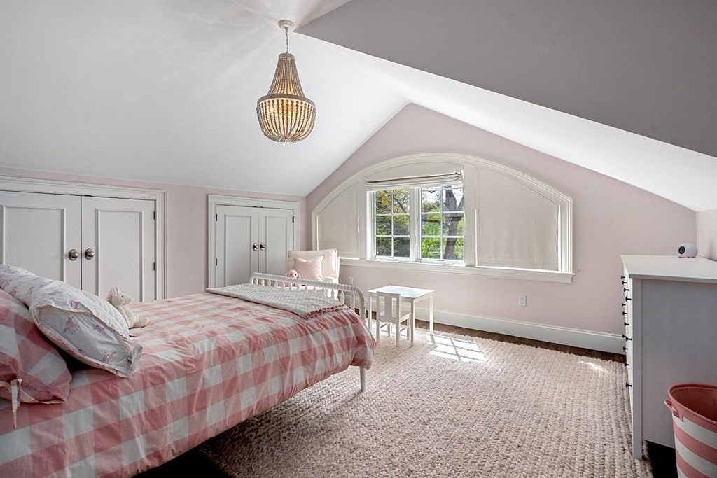 271 Chestnut Street Newton, MA 02465 - Photo 14 of 28 a bedroom with a bed and a window