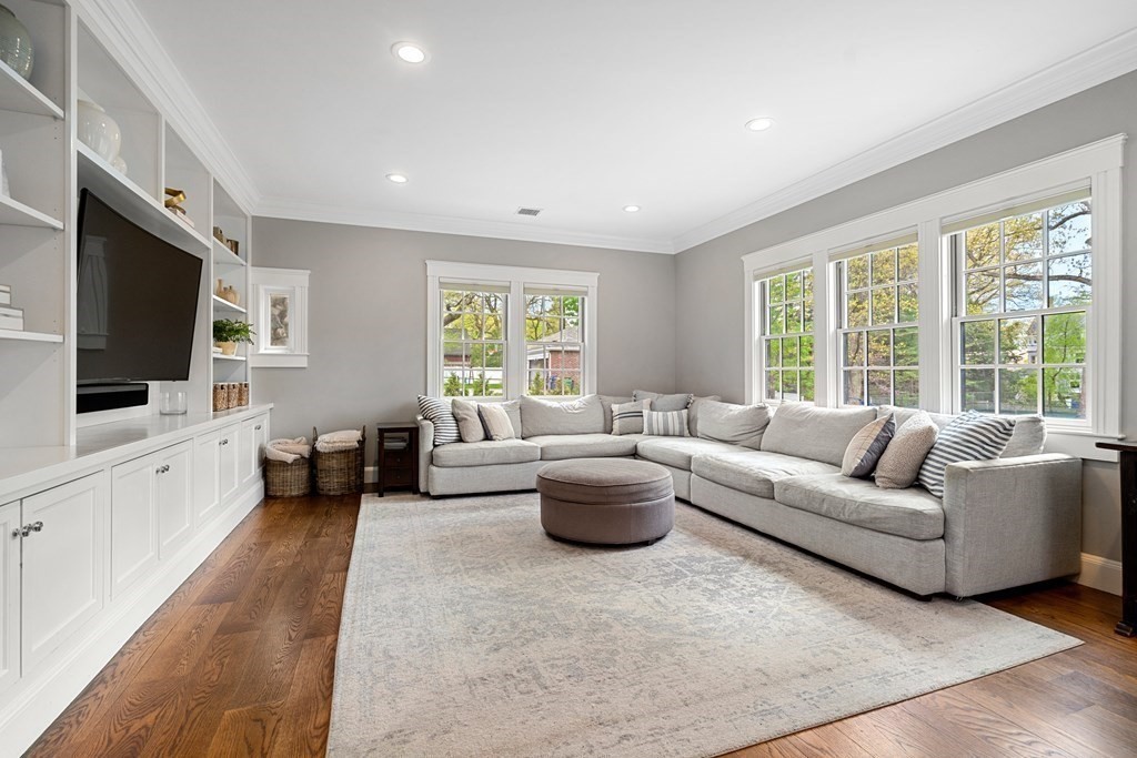271 Chestnut Street Newton, MA 02465 - Photo 4 of 28 a living room with furniture and a flat screen tv