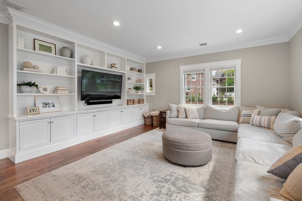 271 Chestnut Street Newton, MA 02465 - Photo 5 of 28 a living room with furniture and a flat screen tv
