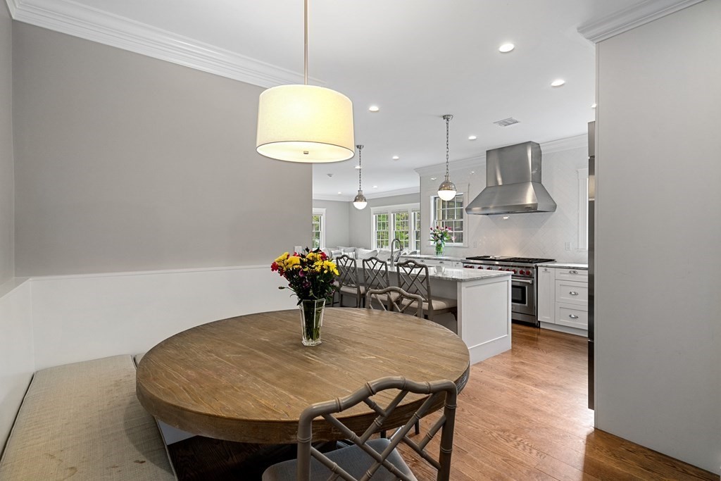 271 Chestnut Street Newton, MA 02465 - Photo 8 of 28 a kitchen with a table and chairs in it