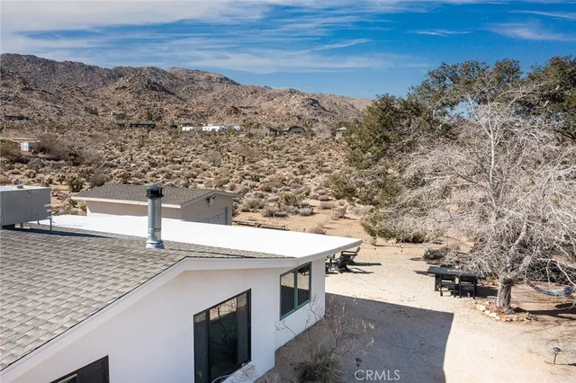 a view of a balcony with an outdoor space