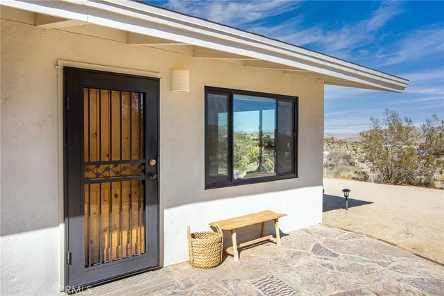 a view of a entryway door front of house