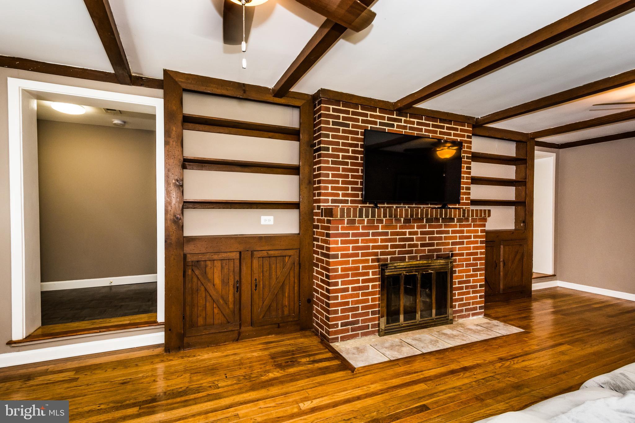 2712 Riverview Drive Riva, MD 21140 - Photo 9 of 34 Exposed beams in living room add character.