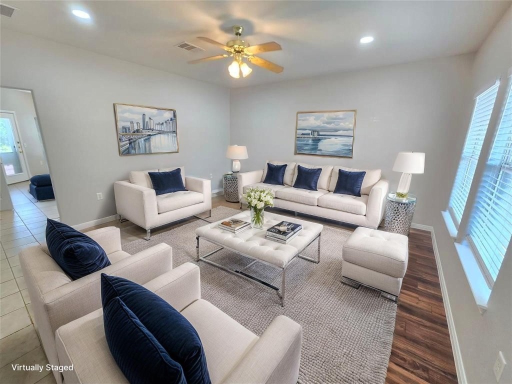 7509 Lazy Creek Drive, Unit B Austin, TX 78724 - Photo 4 of 20 Living area with recessed lighting and ceiling fan