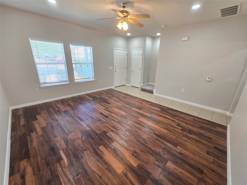 7509 Lazy Creek Drive, Unit B Austin, TX 78724 - Photo 8 of 20 Unfurnished living room featuring recessed lighting, light wood-style flooring, and ceiling fan